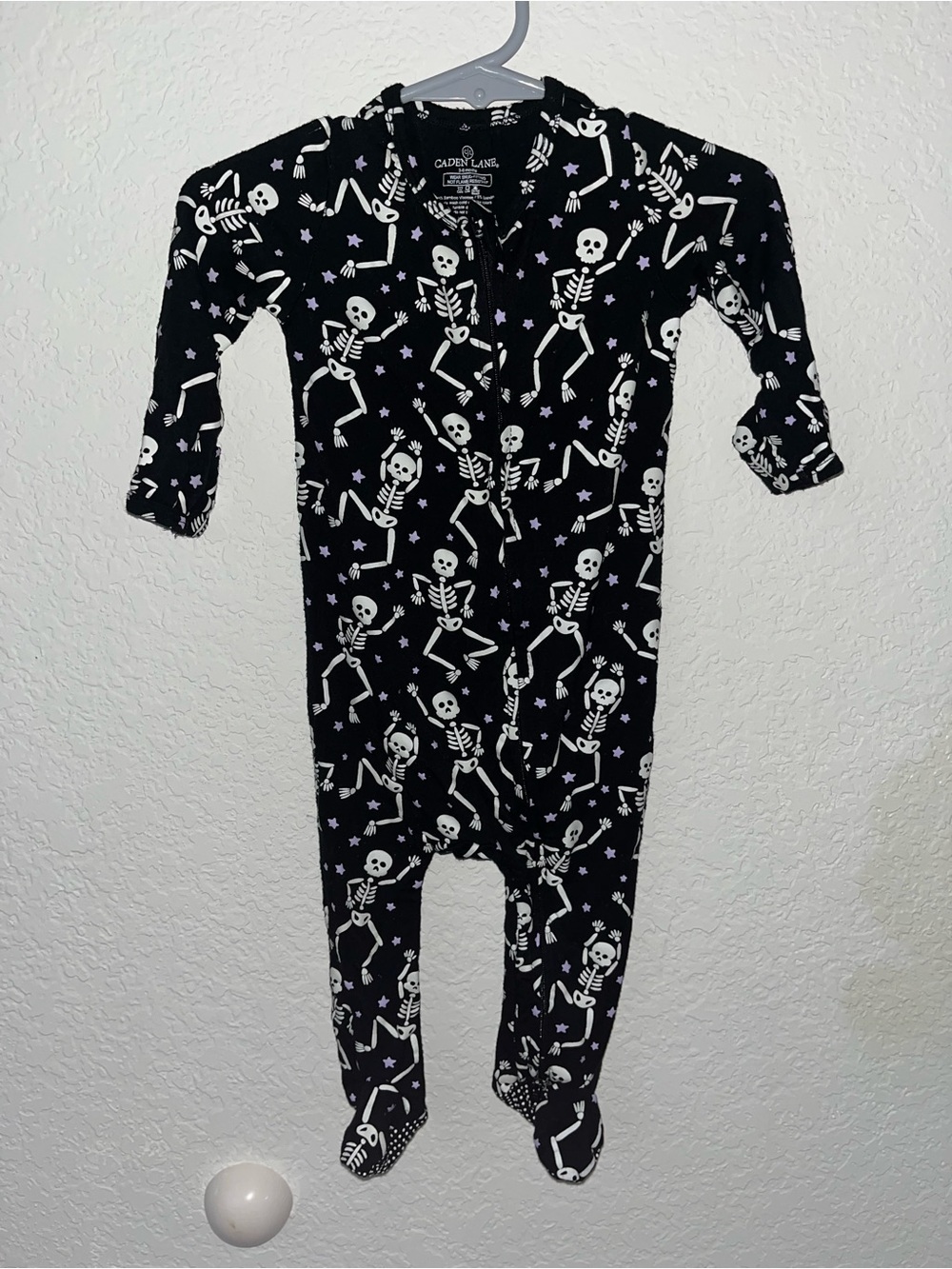 Caden Lane black and white skeleton footie pajamas
